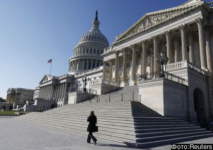 The U.S. Capitol Dome is seen behind the entrance to the U.S. Senate (R) on Capitol Hill in Washington, November 9, 2012.  REUTERS/Larry Downing  (UNITED STATES - Tags: POLITICS)
