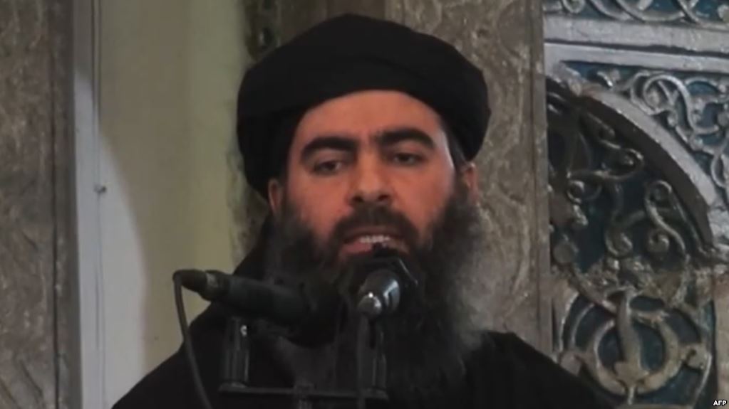 (FILES) - An image grab taken from a propaganda video released on July 5, 2014 by al-Furqan Media allegedly shows the leader of the Islamic State (IS) jihadist group, Abu Bakr al-Baghdadi, adressing Muslim worshippers at a mosque in the militant-held northern Iraqi city of Mosul. Iraq claimed on October 11, 2015 to have struck a convoy carrying Islamic State group leader Abu Bakr al-Baghdadi in an air raid near the Syrian border but said his fate was unknown.   AFP PHOTO / HO / AL-FURQAN MEDIA  == RESTRICTED TO EDITORIAL USE - MANDATORY CREDIT "AFP PHOTO / HO / AL-FURQAN MEDIA " - NO MARKETING NO ADVERTISING CAMPAIGNS - DISTRIBUTED AS A SERVICE TO CLIENTS FROM ALTERNATIVE SOURCES, AFP IS NOT RESPONSIBLE FOR ANY DIGITAL ALTERATIONS TO THE PICTURE'S EDITORIAL CONTENT, DATE AND LOCATION WHICH CANNOT BE INDEPENDENTLY VERIFIED ==