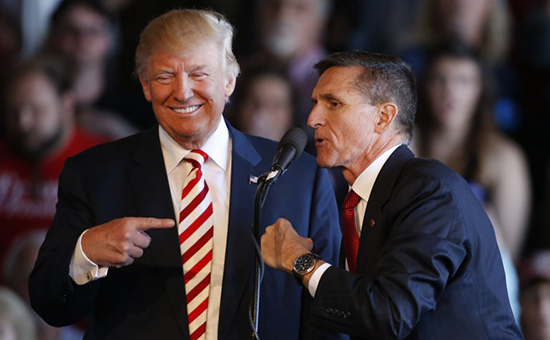 GRAND JUNCTION, CO - OCTOBER 18: Republican presidential candidate Donald Trump (L) jokes with retired Gen. Michael Flynn as they speak at a rally at Grand Junction Regional Airport on October 18, 2016 in Grand Junction Colorado. Trump is on his way to Las Vegas for the third and final presidential debate against Democratic rival Hillary Clinton.   George Frey/Getty Images/AFP